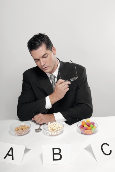 businessman examining food samples