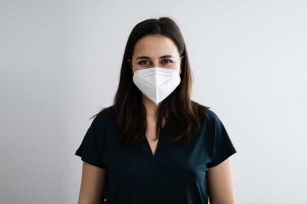 receptionist woman in medical face mask