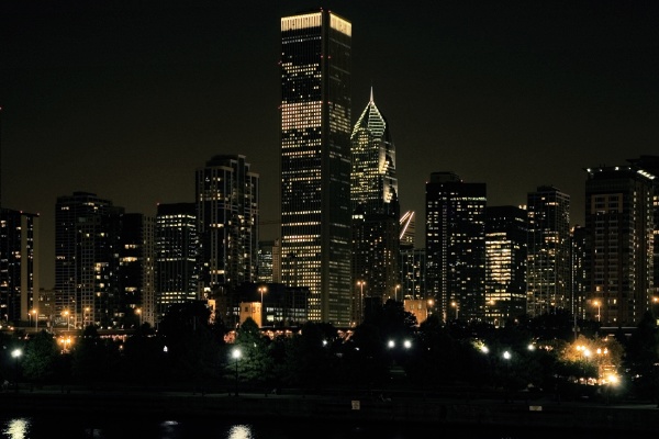 buildings lit up at night