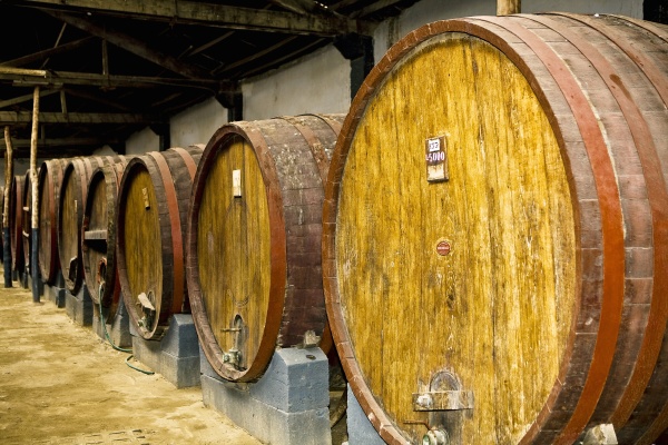 close up of wine barrels