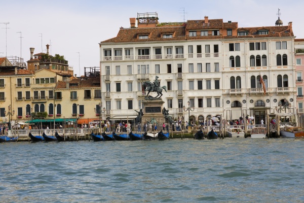 gondolas docked in front of a