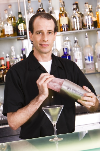 portrait of a bartender preparing a