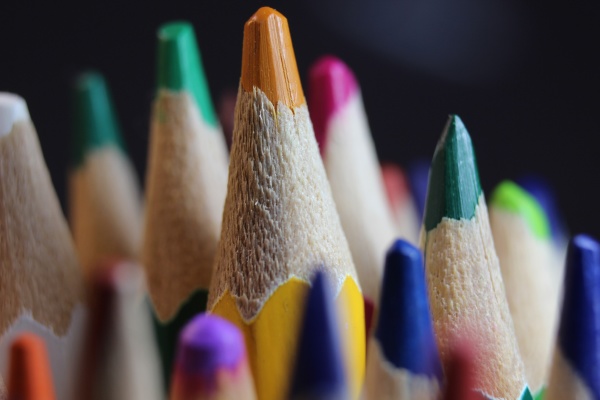 bright colored multicolor pencils on black