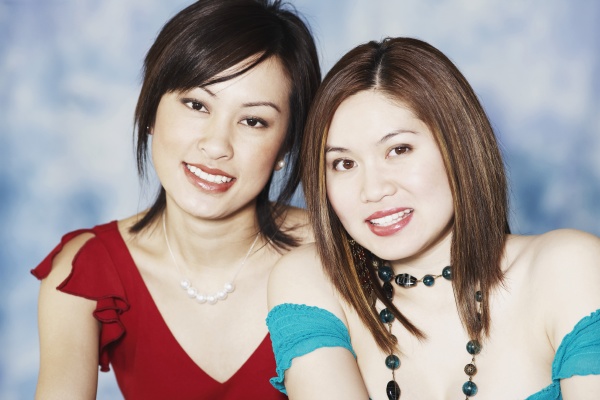 portrait of two young women smiling