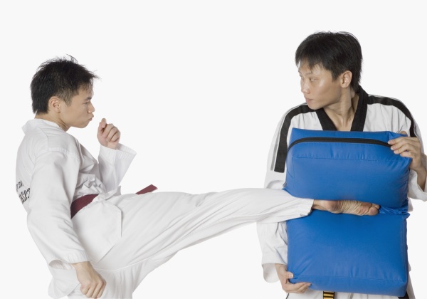 male karate instructor teaching martial arts