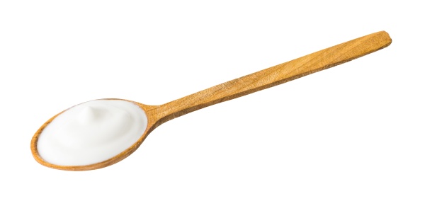 yogurt on wooden spoon