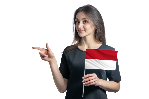 happy young white woman holding flag
