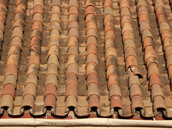 worn old tile brick roof with