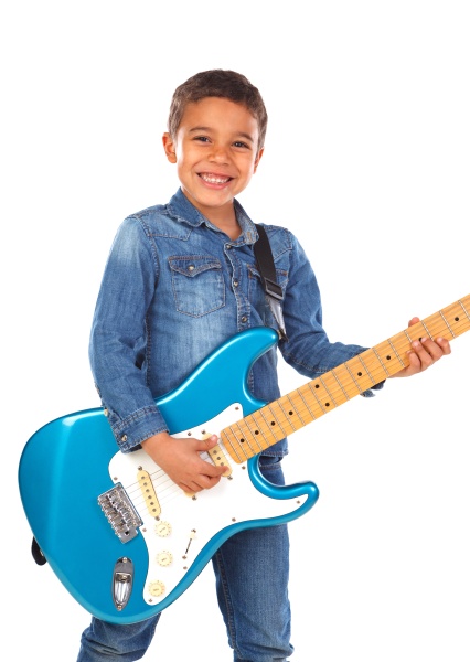 happy child playing electric blue guitar