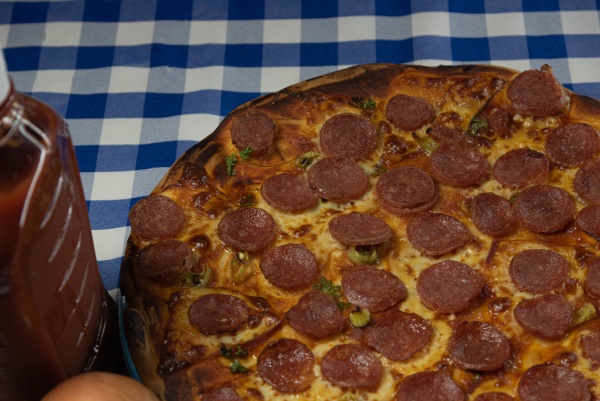 homemade pepperoni and mozzarella cheese pizza