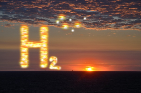 h2 hydrogen letters with a sunset