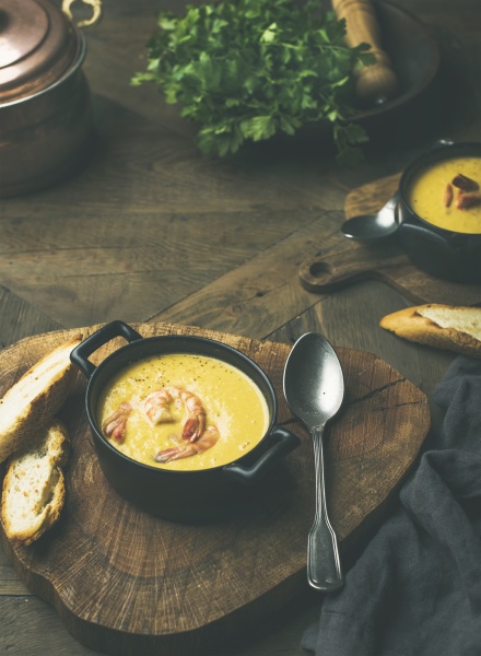 corn creamy soup with shrimps served