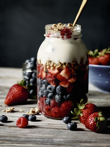 organic berries and yogurt in jar