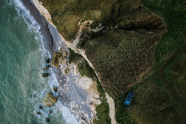 aerial view of car on cliff