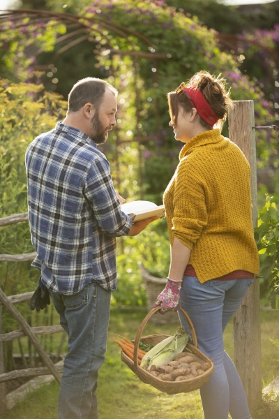 couple with book and fresh harvested