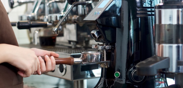 barista making fresh espresso coffee