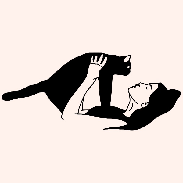 the girl hugs a black cat