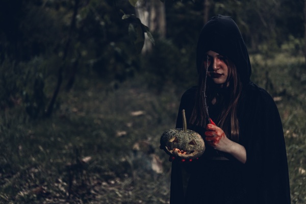 woman ghost horror her holding pumpkin