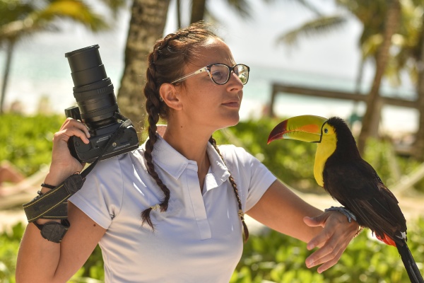nature photographer with toucan