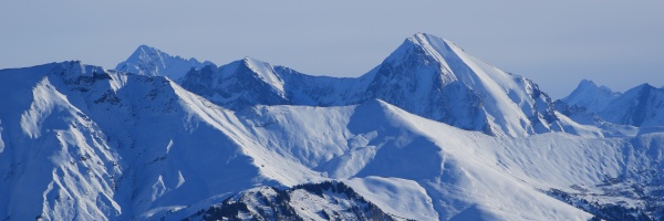 snow covered mountain peaks seen from