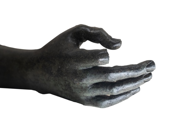 black marble statue hand with broken
