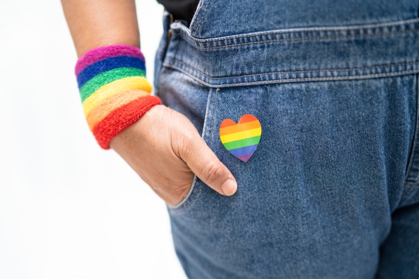 asian lady wearing rainbow flag wristbands