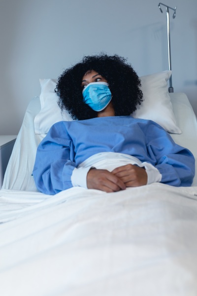 african american female patient lying in