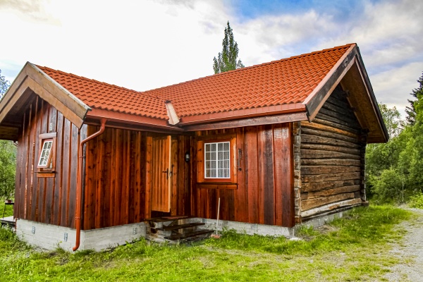 brown red wooden cabin hut