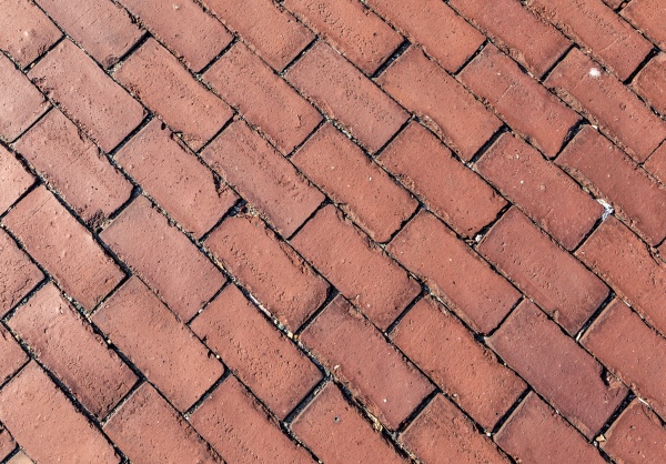 diagonal paved pathway with red brick