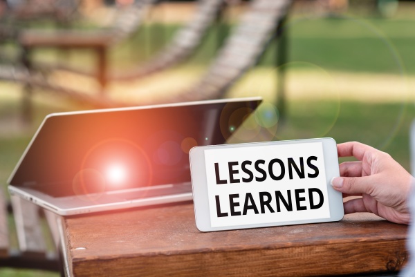 sign displaying lessons learned business