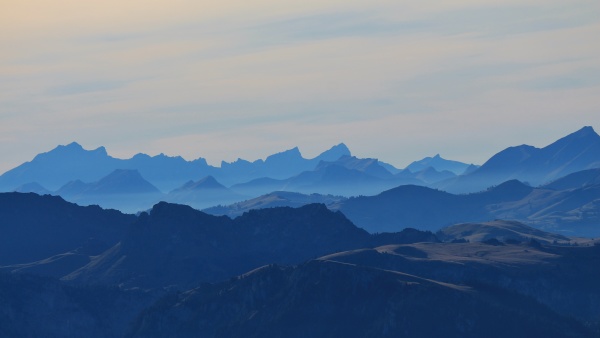 blue silhouettes of mountains in the