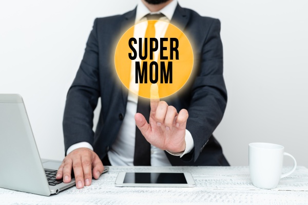 sign displaying super mom business