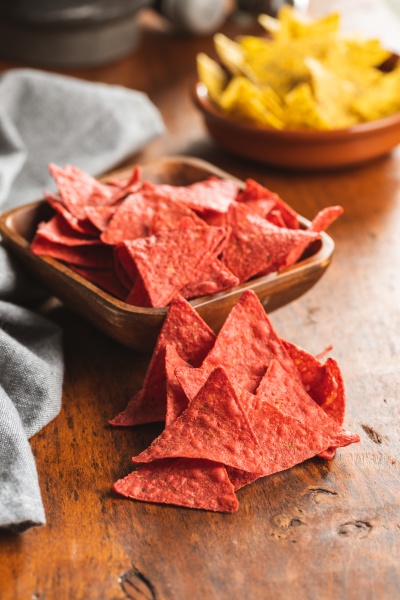 salted tortilla chips triangle with red