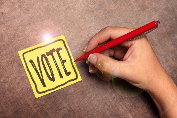 handwriting text vote conceptual photo