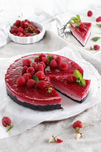 ombre cheesecake with raspberries on a