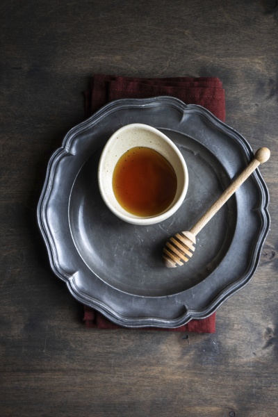 ceramic bowl with organic summer honey
