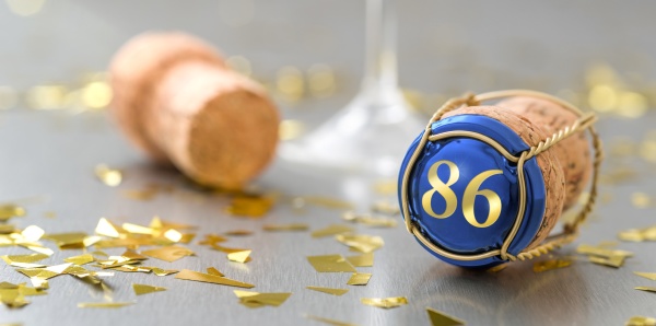 champagne cap with the number 86