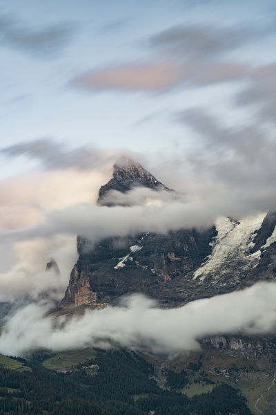 clouds over eiger mountain and green