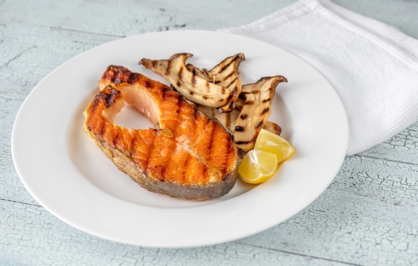 grilled salmon steak with mushrooms