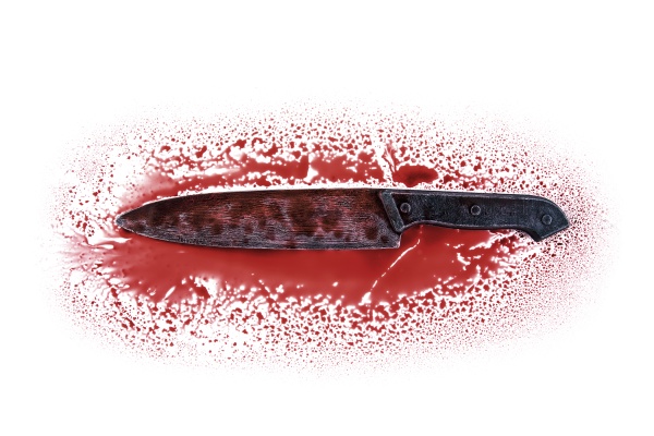 knife blade in red blood on