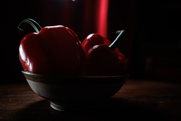 two red pepper in bowl with