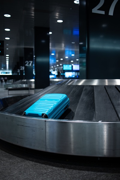 luggage on the luggage claim conveyor