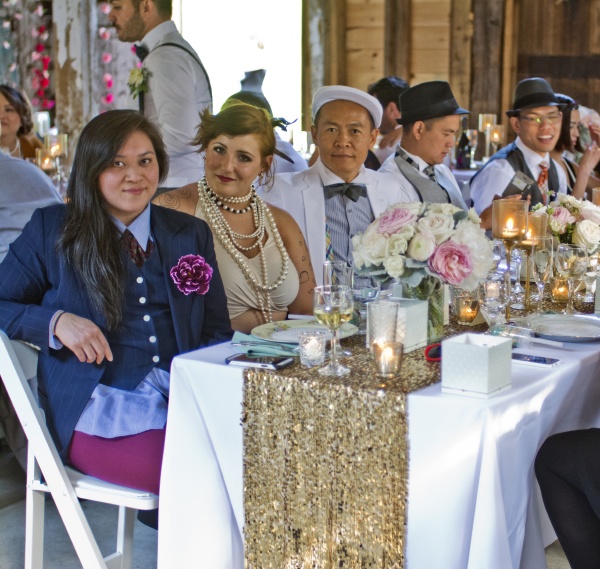 portrait of wedding guests sitting at