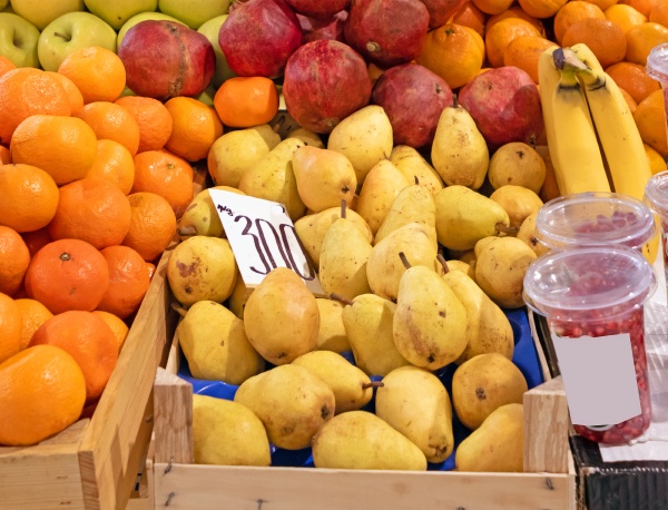 raw organic fruits on market stall