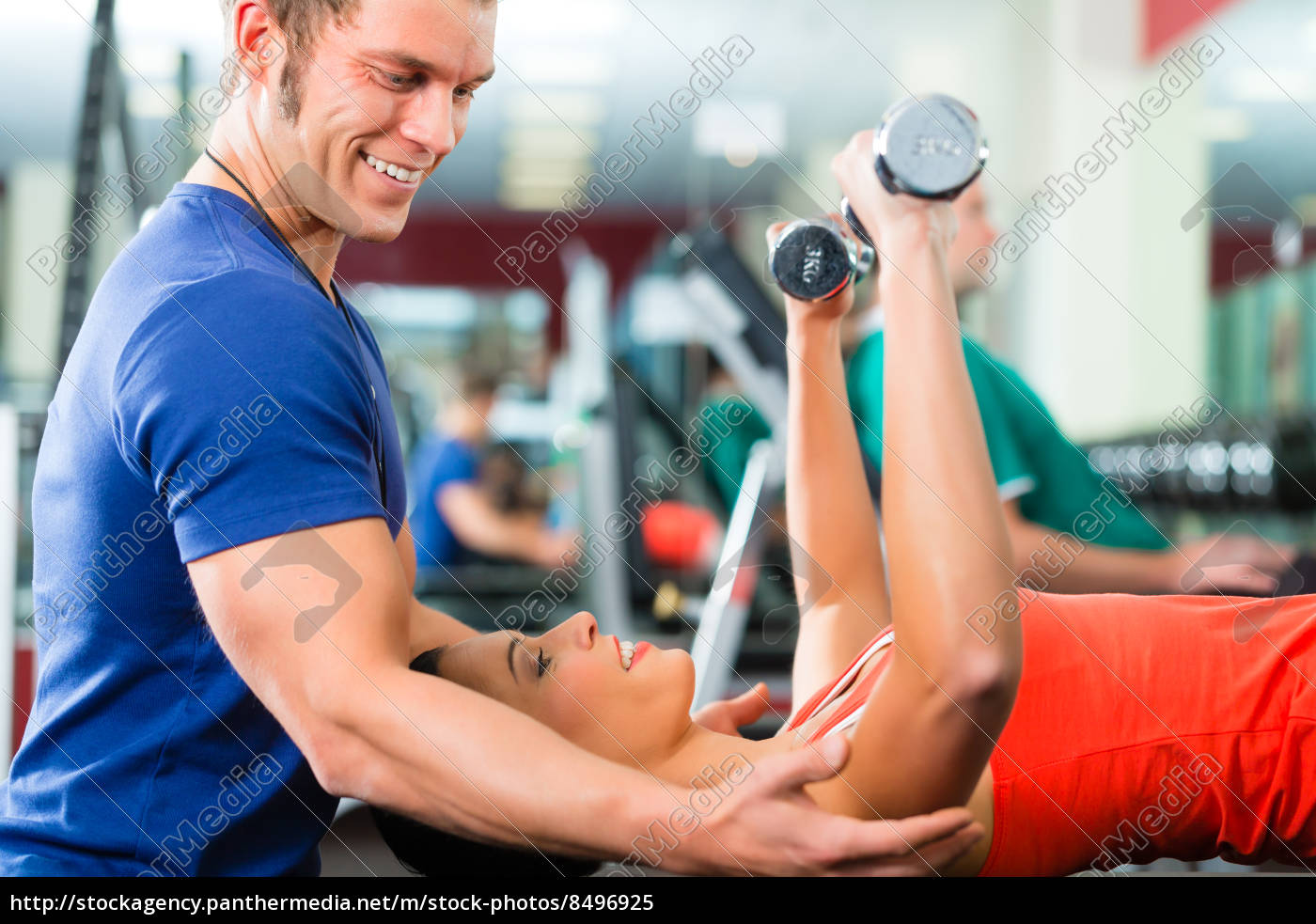 Trainer And Woman In Gym With Dumbbells Stock Photo Panthermedia Stock Agency