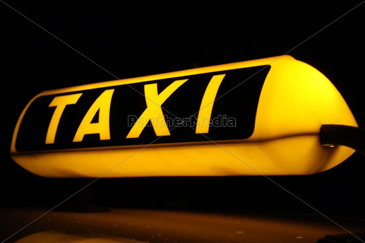 Illuminated taxi sign at night - Royalty free photo #9888544