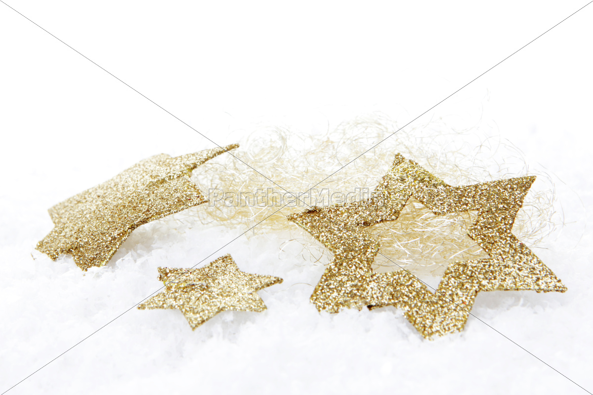 Christmas Golden Christmas Star On Fake Snow Royalty Free Image