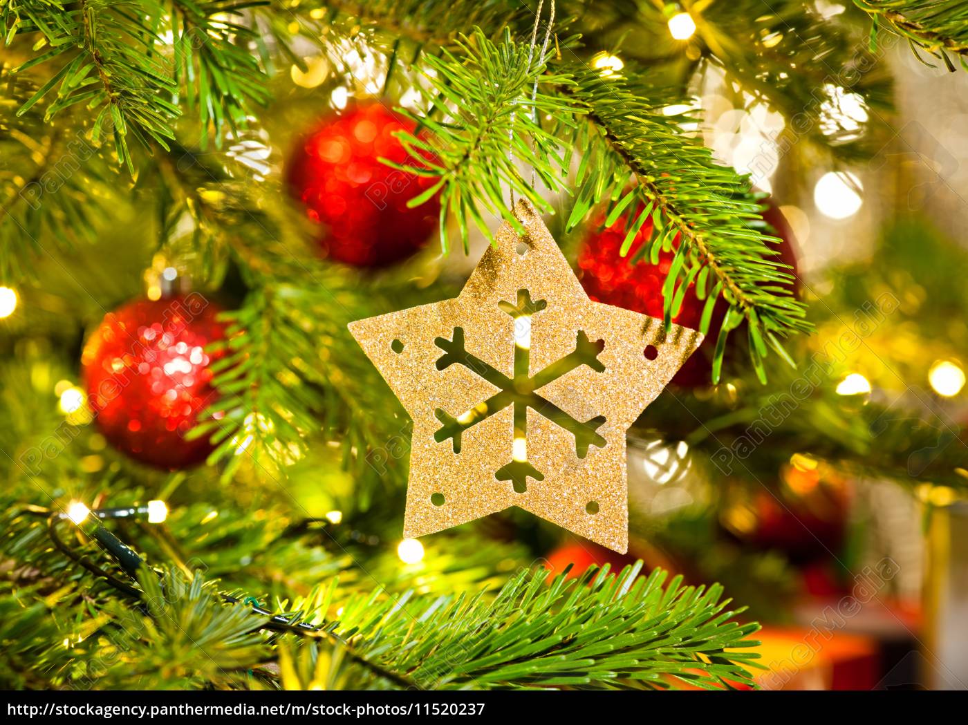 Ornament In A Real Christmas Tree Royalty Free Image 11520237