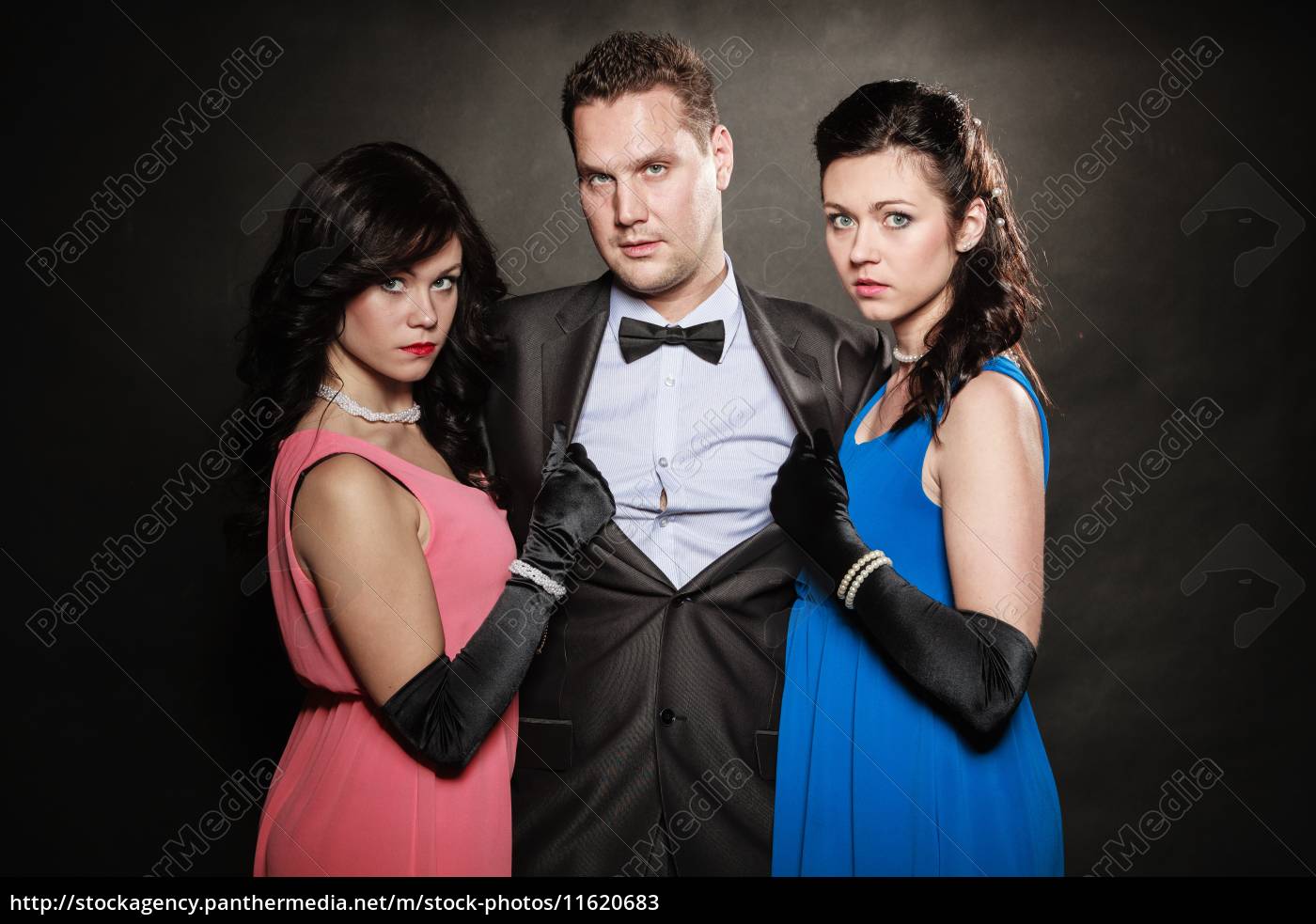 Man with 2 women