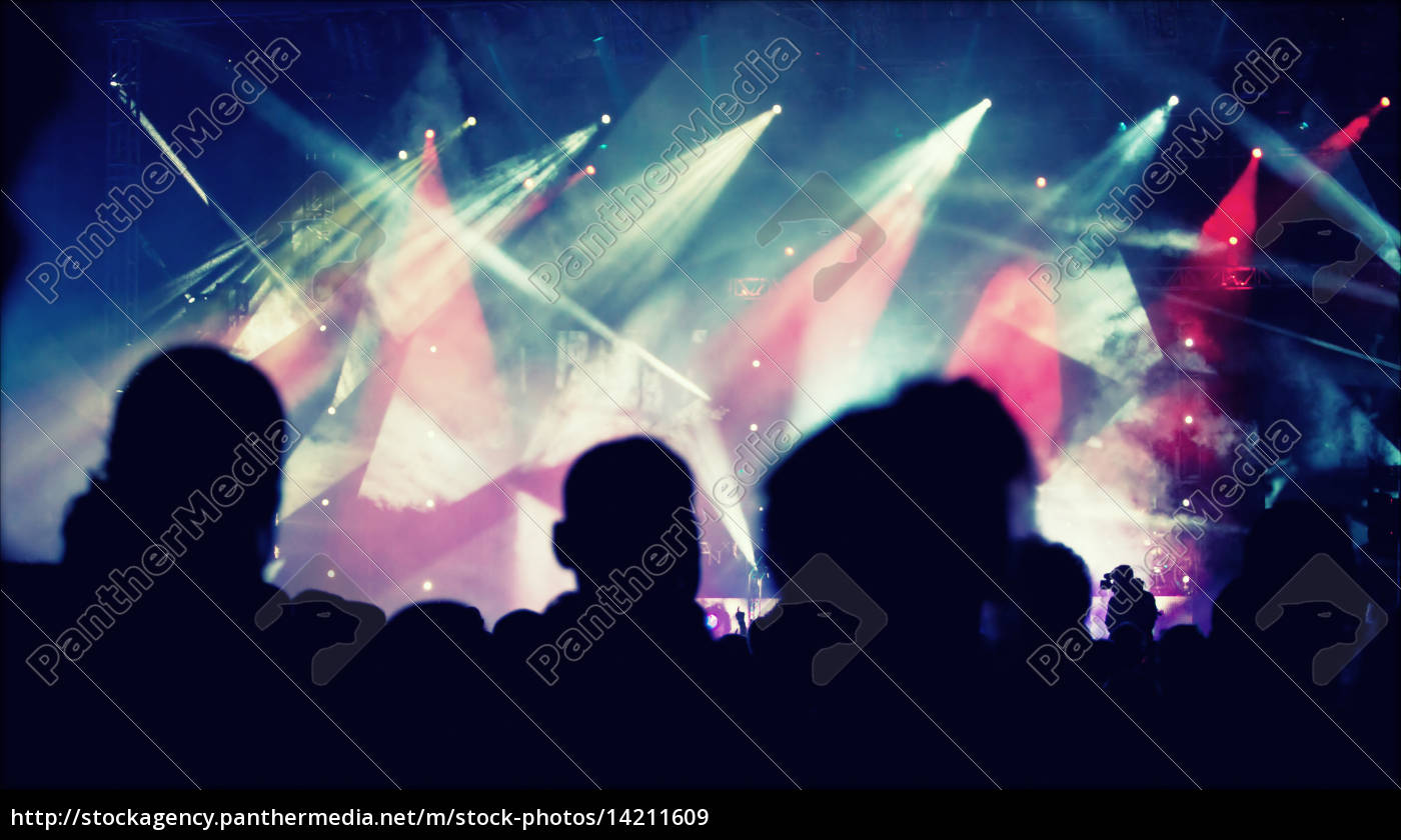 Cheering crowd in front of stage lights - retro photo - Royalty free ...